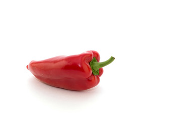 Red pepper on white background. Natural farm product. Image for cafe advertising, food.
