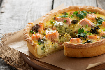 French quiches pie with broccoli,cheese and salmon.