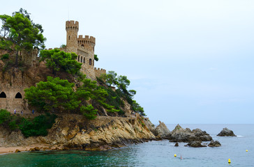 Fototapeta na wymiar Castle at beach in Lloret de Mar, Costa Brava, Spain