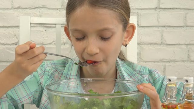 Child Eating Green Salad, Kid in Kitchen, Girl Eat Fresh Vegetable, Healthy Food