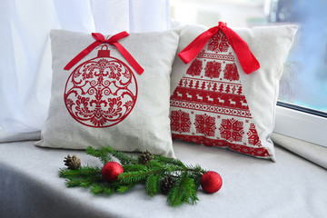 
New Year's interior, linen pillow with Christmas decorations.
