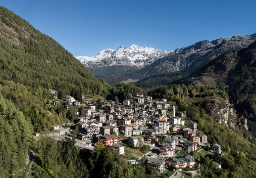 Holidays in Valtellina.
Typical village in mountain with forest and high peaks