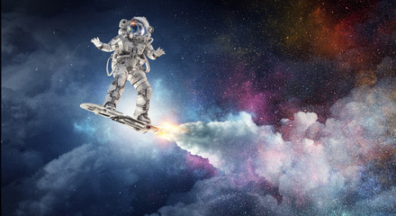 Spaceman on flying board. Mixed media