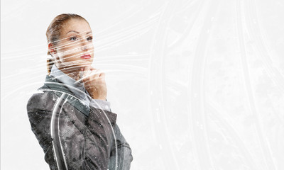 Thoughtful businesswoman with hand on chin