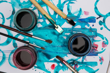 abstract drawing on paper, red, green, blue color ink and old vintage calligraphy pens with nibs,...