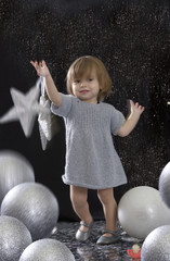 Little girl with Christmas decoration