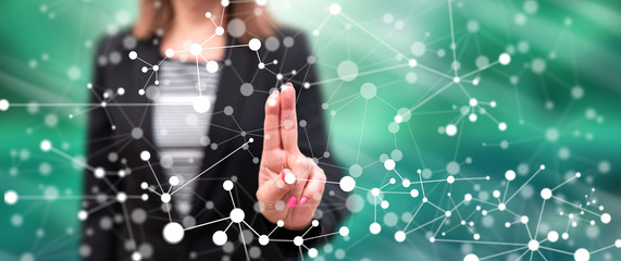 Woman touching a virtual network