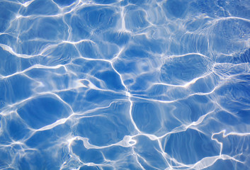 Swimming pool water background close up