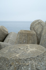 sea bar with protections in stone