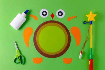 details of diy owl lantern for sankt martin, traditional german feast, color paper, glue, scissors, lanterns wand