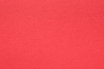 red paper texture background. colored cardboard fibers and grain. empty space concept.