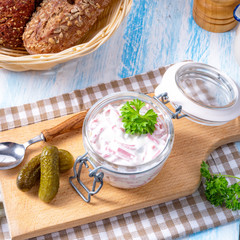delicious homemade meat salad with mayonnaise and cucumber