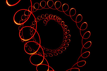 Red light vortex on black