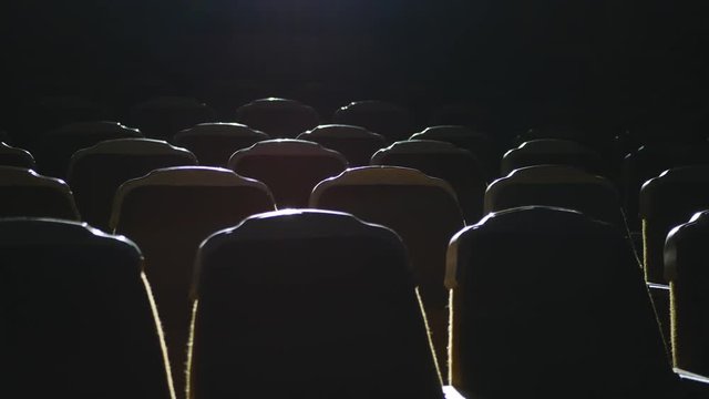Empty comfortable seats in the cinema. Empty seats in the cinema. The cinema is ready for visitors. Left to right
