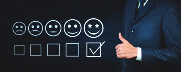 Businessman showing a thumbs up sign. Customer experience concept