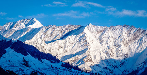 snow covered Himalayas in Manali India. Hampta pass