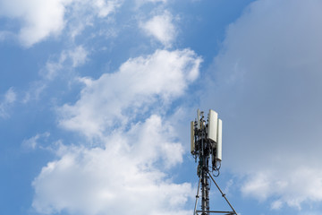 The communications tower with cloud and sky