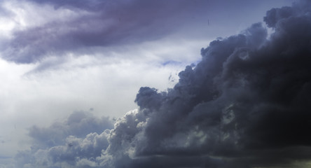 dramatic sky with clouds - approaching storm - light rain