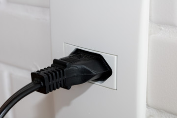 Close-up  eletrical power socket outlet three (3) pin and plug socket - Brazilian standard - Brazil