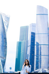 portrait of a beautiful brunette in the city