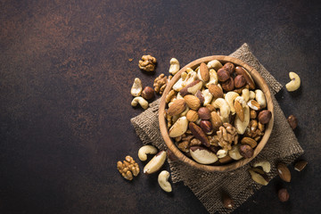 Nuts assortment in a bowl top view.