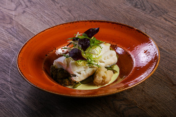 Steamed fith with salad