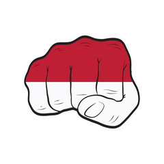 Indonesia flag on a clenched fist. Strength, Power, Protest concept