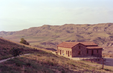 Fototapeta na wymiar house in desert mountains