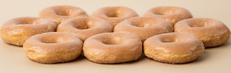 Fototapeta na wymiar Delicious Hot and Fresh Glazed Donuts for Breakfast