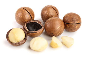 Shelled and unshelled macadamia nuts isolated on white background