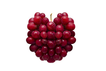 Fresh red grapes in the form of heart isolated on white background