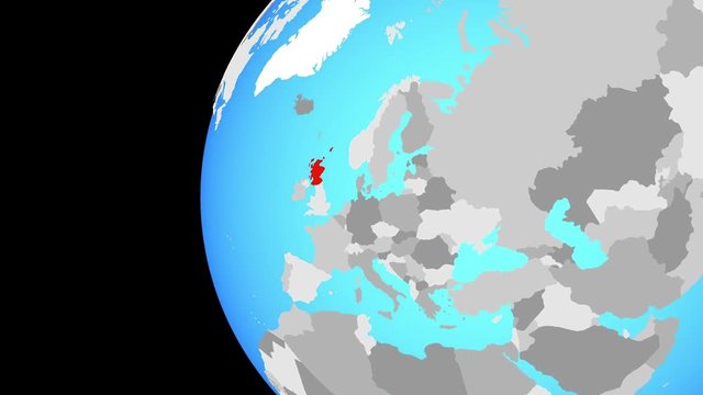 Scotland on blue political globe. Orbiting around globe and zooming to the country. 3D illustration.