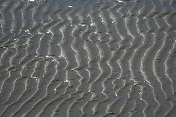 Wellen am Sandstrand