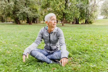 Obraz premium Senior Woman Relax After Exercise In Nature