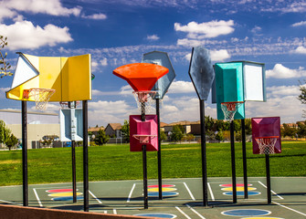 Multi Level Basket Ball Hoops At Local Playground