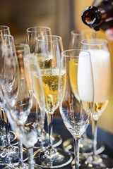 champagne glasses on catering table