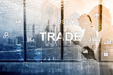 Stock trading candlestick chart and diagrams on blurred office center background.