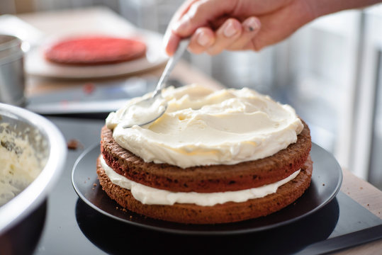 chef making red velvet cake