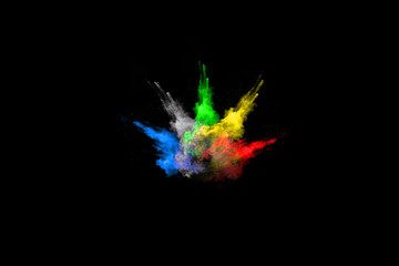 abstract colored dust explosion on a black background.abstract powder splatted background,Freeze motion of color powder exploding/throwing color powder, multicolored glitter texture.