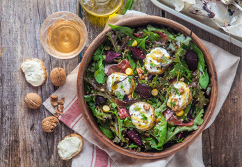 Beet and goat cheese salad in a pot, rustic style