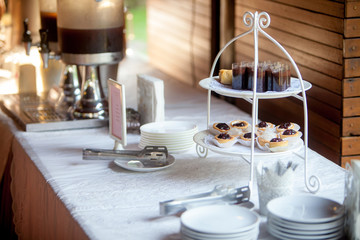 Delicious Mini Cakes on Buffet Table