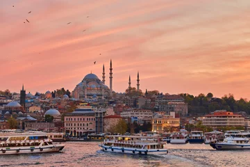 Foto op Plexiglas Bosphorus strait with ferry boats on the sunset in Istanbul © Ryzhkov Oleksandr