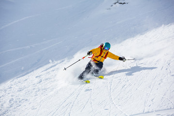 Fototapeta na wymiar Skiing in the snowy mountains, good winter day.