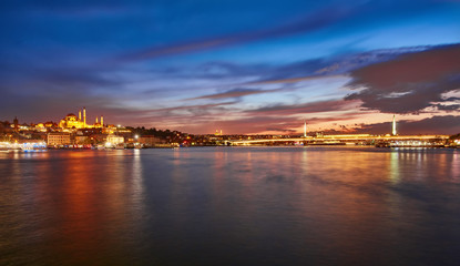 Fototapeta na wymiar Night view to Suleymaniye Cami, from Galata Bridge, Istanbul