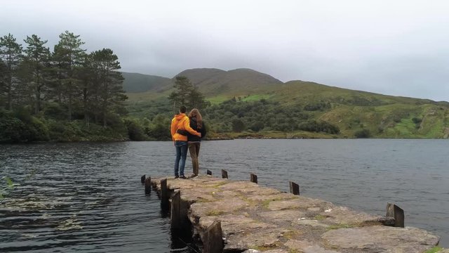 Couple in love at a beautiful lake