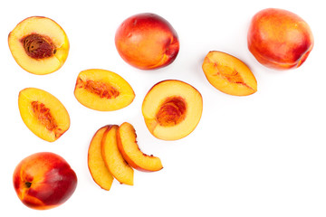 ripe nectarine with leaves isolated on white background with copy space for your text. Top view. Flat lay pattern