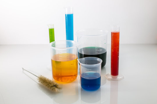 Laboratory glassware with colorful chemical reagent in research laboratory