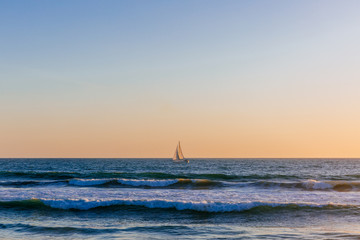 Sunset over sail boat near Venice Beach