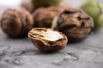 close up of walnuts on a stone background