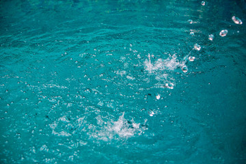 Obraz premium Water in pool splashing, abstract art picture for background, wallpaper,screensaver, copy-space, add-text,water emotion is concept